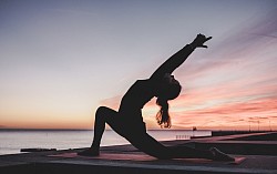 A yogi is performing yoga pose to fit your body and mind.