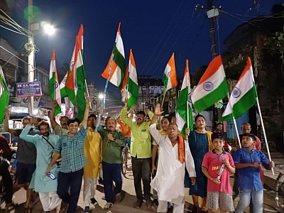 Peoples of Bihar celebrating sucess of soft landing of Chandrayan 3 on the surface of the North Pole of Moon. Nation flags Tiranga (tricolous)are their hands.
